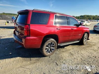 Trzecie zdjęcie samochodu z tyłu: 2019 CHEVROLET TAHOE C1500 LT VIN:1GNSCBKC9KR292725 - miniatura