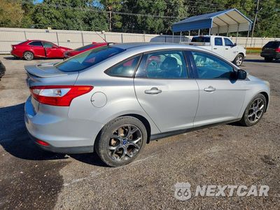 Trzecie zdjęcie samochodu z tyłu: 2013 FORD FOCUS SE VIN:1FADP3F22DL320311 - miniatura