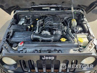 Zdjęcie 12 z 13 samochodu: 2014 JEEP WRANGLER UNLIMITED SAHARA VIN:1C4BJWEG6EL126271 - miniatura