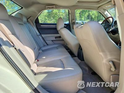 Zdjęcie 10 z 13 samochodu: 2006 CHRYSLER 300C VIN:2C3KA63H26H398248 - miniatura