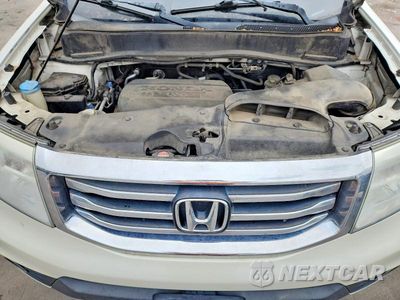Zdjęcie 12 z 13 samochodu: 2013 HONDA PILOT TOURING VIN:5FNYF4H98DB045318 - miniatura