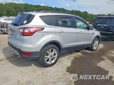 Trzecie zdjęcie samochodu z tyłu: 2018 FORD ESCAPE SE VIN:1FMCU0GD8JUB74916 - miniatura