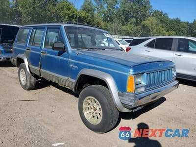 Czwarte zdjęcie samochodu z boku: 1990 JEEP CHEROKEE LAREDO VIN:1J4FJ58L4LL148491 - miniatura