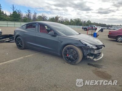 Czwarte zdjęcie samochodu z boku: 2022 TESLA MODEL 3 VIN:5YJ3E1EC1NF208498 - miniatura