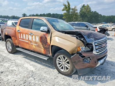 Czwarte zdjęcie samochodu z boku: 2018 GMC CANYON SLT VIN:1GTG5DEN9J1238002 - miniatura
