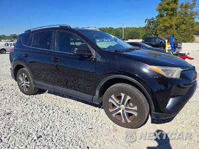Czwarte zdjęcie samochodu z boku: 2018 TOYOTA RAV4 LE VIN:2T3ZFREV9JW497917 - miniatura