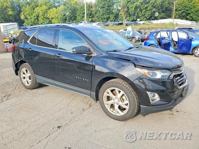 Czwarte zdjęcie samochodu z boku: 2019 CHEVROLET EQUINOX LT VIN:2GNAXVEX4K6137754 - miniatura