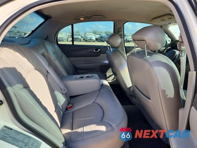 Zdjęcie 10 z 12 samochodu: 1998 LINCOLN CONTINENTAL VIN:1LNFM97V3WY640553 - miniatura