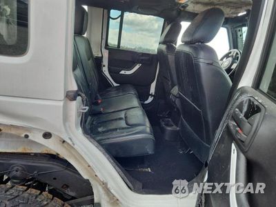 Zdjęcie 10 z 12 samochodu: 2013 JEEP WRANGLER UNLIMITED RUBICON VIN:1C4HJWFG2DL570156 - miniatura