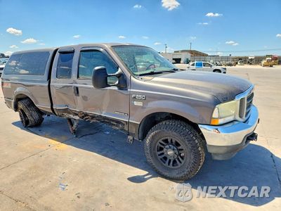 Czwarte zdjęcie samochodu z boku: 2003 FORD F250 SUPER DUTY VIN:1FTNX21F93EA82267 - miniatura