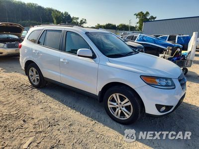 Czwarte zdjęcie samochodu z boku: 2012 HYUNDAI SANTA FE SE VIN:5XYZHDAG0CG131673 - miniatura