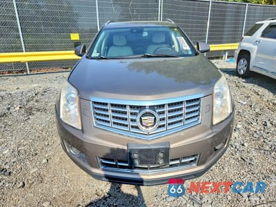 Piąte zdjęcie samochodu w środku: 2014 CADILLAC SRX PREMIUM COLLECTION VIN:3GYFNGE38ES586299 - miniatura