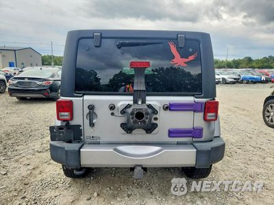 Zdjęcie 6 z 12 samochodu: 2015 JEEP WRANGLER UNLIMITED SAHARA VIN:1C4BJWEG5FL626777 - miniatura
