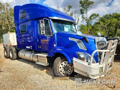 Czwarte zdjęcie samochodu z boku: 2016 VOLVO VNL SEMI TRUCK VIN:4V4NC9EH9GN929363 - miniatura