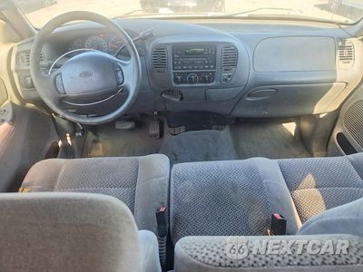 Zdjęcie 8 z 12 samochodu: 2002 FORD F150 VIN:1FTRX17L42NA70504 - miniatura