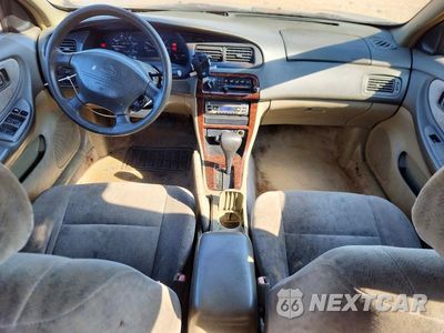 Zdjęcie 8 z 13 samochodu: 1999 NISSAN ALTIMA XE VIN:1N4DL01D4XC120019 - miniatura