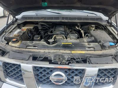 Zdjęcie 11 z 12 samochodu: 2005 NISSAN TITAN XE VIN:1N6BA06A05N540574 - miniatura