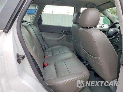 Zdjęcie 11 z 13 samochodu: 2007 FORD FOCUS ZXW VIN:1FAFP36NX7W112571 - miniatura
