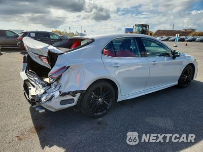 Trzecie zdjęcie samochodu z tyłu: 2024 TOYOTA CAMRY XSE VIN:4T1K61AK7RU245974 - miniatura