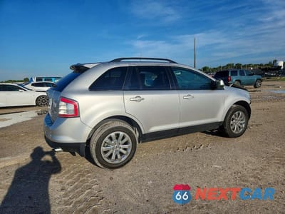 Trzecie zdjęcie samochodu z tyłu: 2010 FORD EDGE SEL VIN:2FMDK3JC9ABB19392 - miniatura