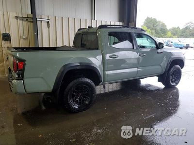 Trzecie zdjęcie samochodu z tyłu: 2021 TOYOTA TACOMA TRD PRO VIN:5TFCZ5AN0MX280946 - miniatura