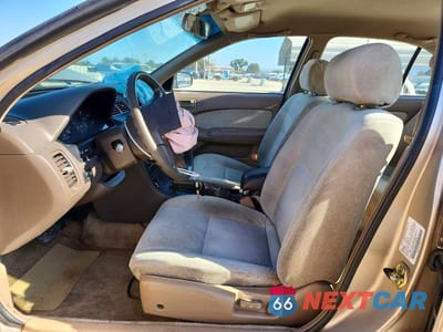 Zdjęcie 7 z 12 samochodu: 1996 NISSAN MAXIMA GXE VIN:JN1CA21D8TM418412 - miniatura