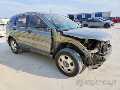 Czwarte zdjęcie samochodu z boku: 2010 HONDA CR-V LX VIN:3CZRE3H37AG703580 - miniatura