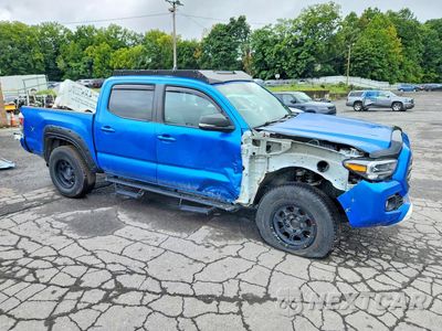 Czwarte zdjęcie samochodu z boku: 2023 TOYOTA TACOMA TRD OFF-ROAD VIN:3TYCZ5AN4PT105176 - miniatura