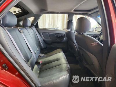 Zdjęcie 10 z 12 samochodu: 2002 HYUNDAI ELANTRA GT VIN:KMHDN55D62U058973 - miniatura