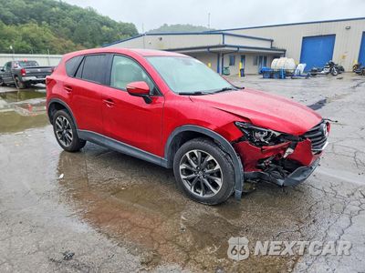Czwarte zdjęcie samochodu z boku: 2016 MAZDA CX-5 GT VIN:JM3KE4DY9G0740777 - miniatura