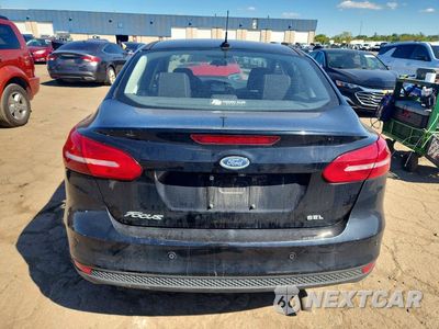 Zdjęcie 6 z 12 samochodu: 2017 FORD FOCUS SEL VIN:1FADP3H28HL295210 - miniatura