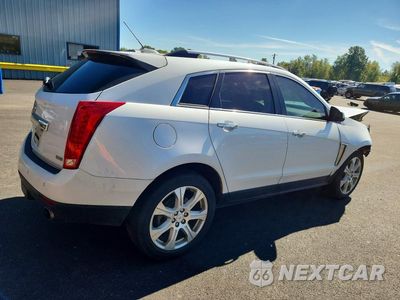 Trzecie zdjęcie samochodu z tyłu: 2015 CADILLAC SRX PREMIUM COLLECTION VIN:3GYFNGE32FS621467 - miniatura