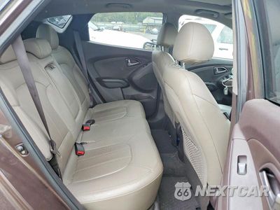Zdjęcie 11 z 13 samochodu: 2014 HYUNDAI TUCSON LIMITED VIN:KM8JUCAGXEU823875 - miniatura