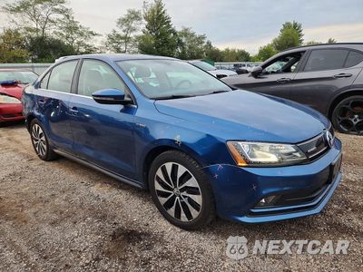 Czwarte zdjęcie samochodu z boku: 2016 VOLKSWAGEN JETTA HYBRID VIN:3VW637AJ8GM362454 - miniatura