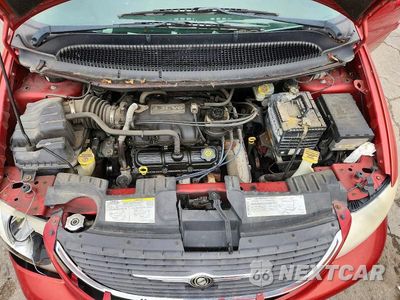 Zdjęcie 11 z 12 samochodu: 2004 CHRYSLER TOWN & COUNTRY LX VIN:2C8GP44R14R594084 - miniatura