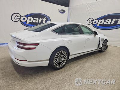 Trzecie zdjęcie samochodu z tyłu: 2023 GENESIS ELECTRIFIED G80 BASE VIN:KMTGE4S17PU005908 - miniatura