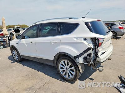 Drugie zdjęcie samochodu z przodu: 2017 FORD ESCAPE TITANIUM VIN:1FMCU0J90HUA38603 - miniatura