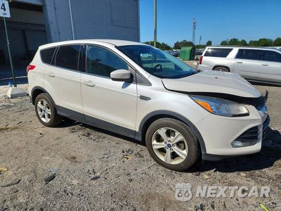 Czwarte zdjęcie samochodu z boku: 2014 FORD ESCAPE SE VIN:1FMCU0GX9EUE07654 - miniatura
