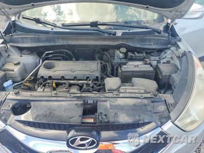 Zdjęcie 12 z 13 samochodu: 2011 HYUNDAI TUCSON LIMITED VIN:KM8JU3AC1BU295054 - miniatura