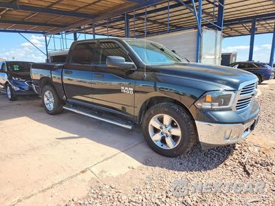 Czwarte zdjęcie samochodu z boku: 2018 RAM 1500 SLT VIN:1C6RR7LG7JS154359 - miniatura