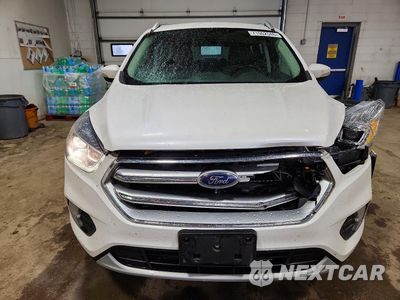Piąte zdjęcie samochodu w środku: 2017 FORD ESCAPE TITANIUM VIN:1FMCU9JD0HUB60869 - miniatura