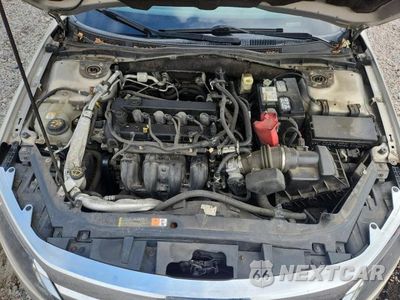 Zdjęcie 11 z 12 samochodu: 2010 FORD FUSION SE VIN:3FAHP0HA3AR211423 - miniatura