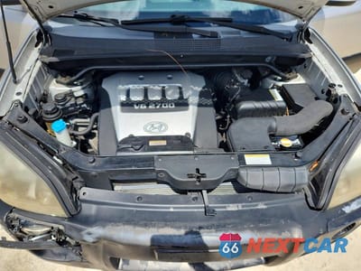 Zdjęcie 12 z 13 samochodu: 2005 HYUNDAI TUCSON GLS VIN:KM8JN12D35U086203 - miniatura