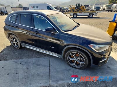 Czwarte zdjęcie samochodu z boku: 2016 BMW X1 XDRIVE28I VIN:WBXHT3C38G5E47406 - miniatura