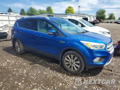 Czwarte zdjęcie samochodu z boku: 2017 FORD ESCAPE TITANIUM VIN:1FMCU9JD2HUB64633 - miniatura