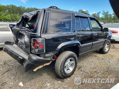 Trzecie zdjęcie samochodu z tyłu: 1997 JEEP GRAND CHEROKEE LAREDO VIN:1J4GZ58S9VC503288 - miniatura