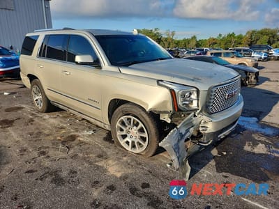 Czwarte zdjęcie samochodu z boku: 2017 GMC YUKON DENALI VIN:1GKS1CKJ9HR233786 - miniatura