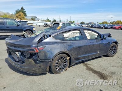 Trzecie zdjęcie samochodu z tyłu: 2024 TESLA MODEL 3 VIN:5YJ3E1EB1RF753923 - miniatura