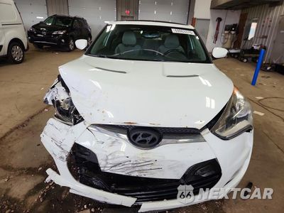 Piąte zdjęcie samochodu w środku: 2014 HYUNDAI VELOSTER BASE VIN:KMHTC6AD2EU211950 - miniatura