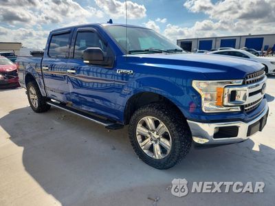 Czwarte zdjęcie samochodu z boku: 2018 FORD F150 SUPERCREW VIN:1FTEW1C50JKC62723 - miniatura